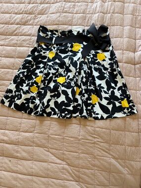 Blue Sand Italian Pleated Mini Skirt With Tie Belt Bold Black and Yellow Print